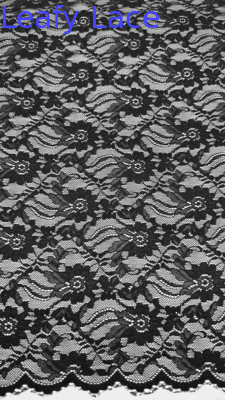 Ganz breit gestrecktes Spitzengewebe in schwarz elegantes Blumenmuster und schallige Kanten für Modefrauen Kleid