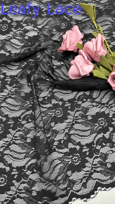Ganz breit gestrecktes Spitzengewebe in schwarz elegantes Blumenmuster und schallige Kanten für Modefrauen Kleid
