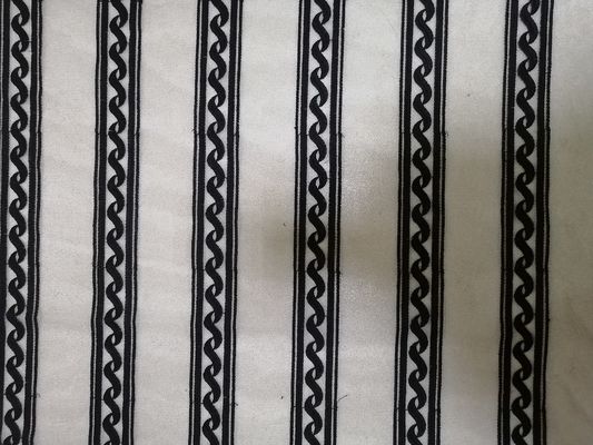 Lineares geometrisches schwarzes gesticktes Spitze-Nylongewebe